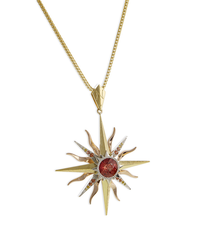 CASE Award for Jewelry $2,001 to $5,000 (retail) 14K white and rose gold and 18K yellow gold pendant featuring a 3.73 carat orange sapphire surrounded by graduated color orange to yellow melee sapphires. The Gem Vault , Flemington, NJ Designed by Jason Baskin