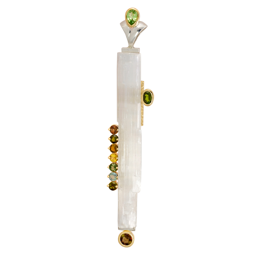 Jewelry Up to $2,000 A hand carved raw Selenite crystal pendant accented by a .66 carat pear shaped grossular garnet, a .50 carat oval green tourmaline, a .66 carat round andalusite, a .27 carat andalusite, and six 4 mm round assorted green tourmalines (1.65 ctw). Set in sterling silver and 14K gold. Jeweler: Chris Jensen C3 Designs South Milwaukee, WI