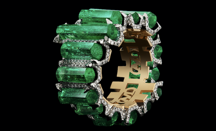 Rings $5,001 and Up One-Of-a-Kind 15.27 carat hexagon cut Muzo-mine Columbian emeralds and diamonds wide eternity band set in platinum on an 18-karat yellow gold Alexandra Mor logo gallery Designed by: Alexandra Mor Alexandra Mor New York, NY $55,000