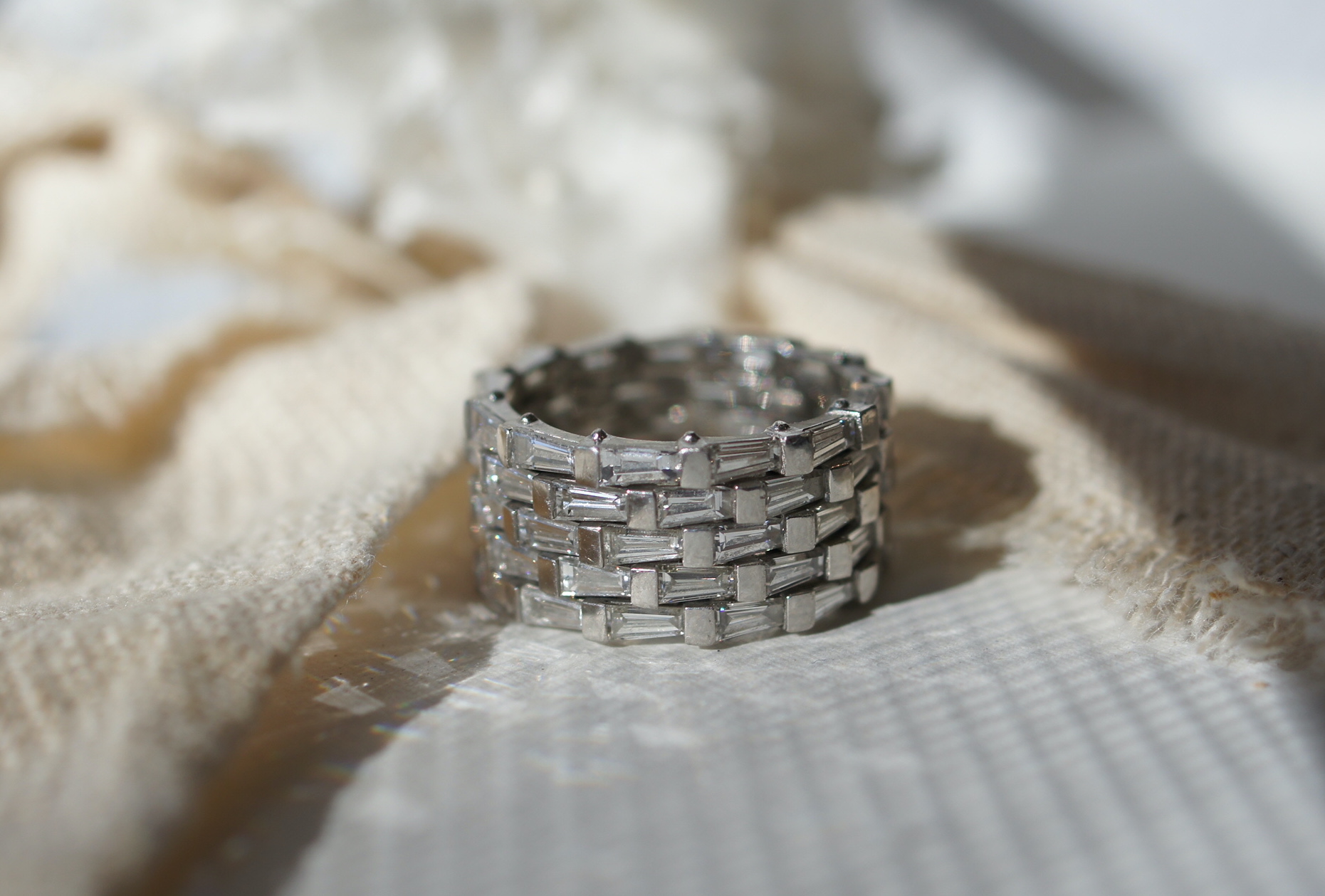 Retailer: Jewelry $10,001 to $50,000 Tapered diamond ring (7.80 ctw) set in platinum Designed by: Louisa Bir Lucketté at Sierra Jewelry Co. Mammoth Lakes, CA $22,000