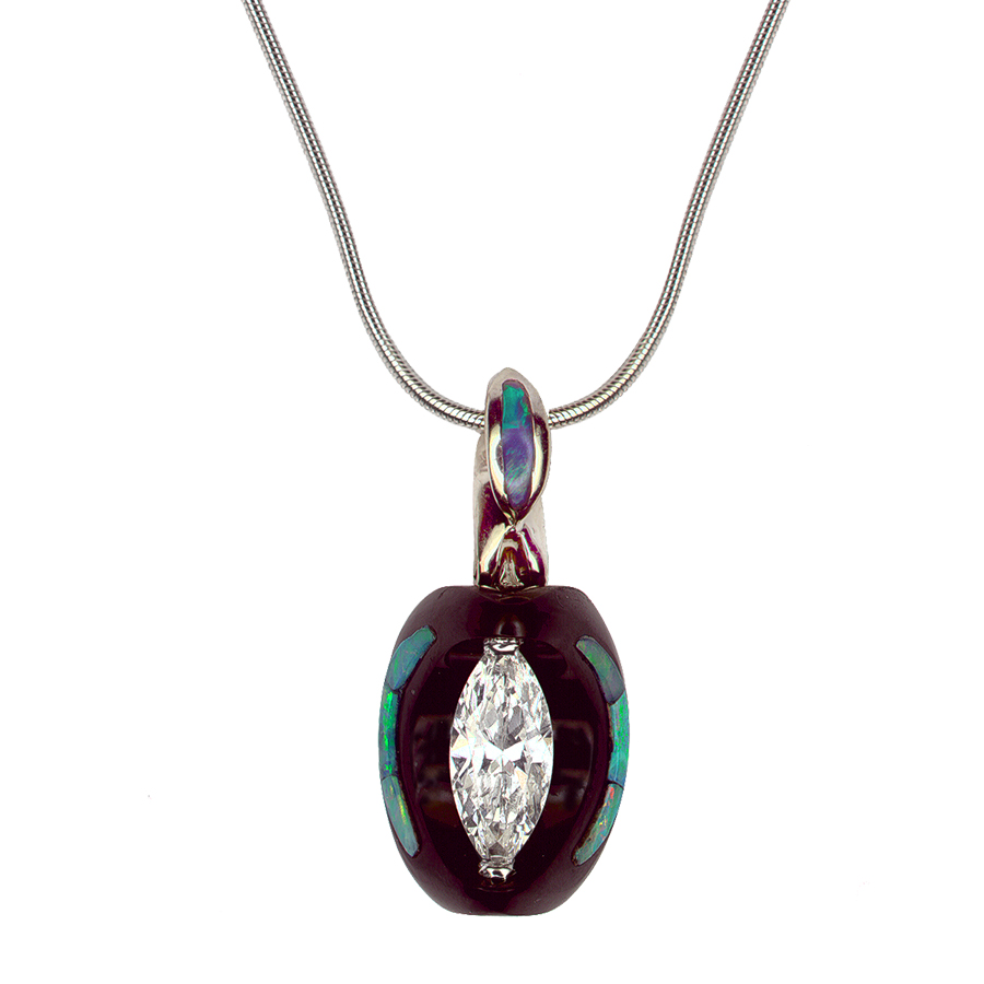 Buyers’ Choice Award Hand-sculpted black jade pendant with diamond and opals Jeweler: Mark Abbott Mark Abbott Jewelers Powell, OH
