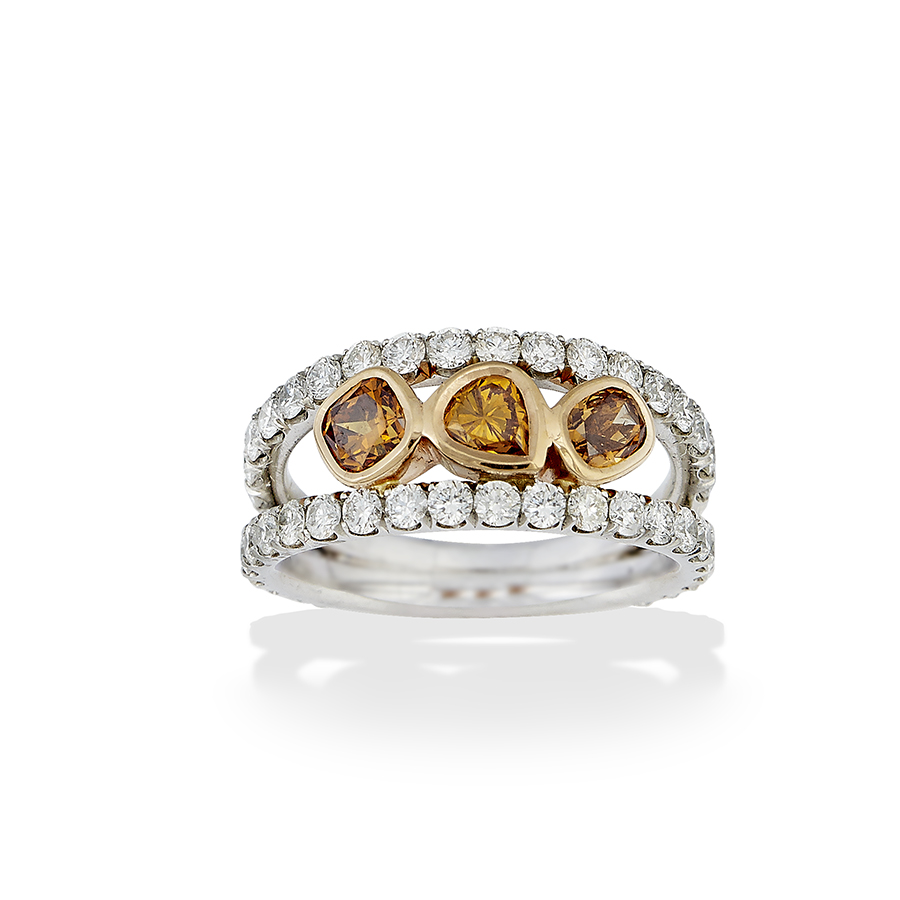 Jewelry $5,001 to $10,000 Platinum and 18K rose gold ring featuring 48 diamonds and fancy brown diamonds (0.87 ctw) Jeweler: Sarkis Sarkissian Giraux Fine Jewelry San Francisco, CA