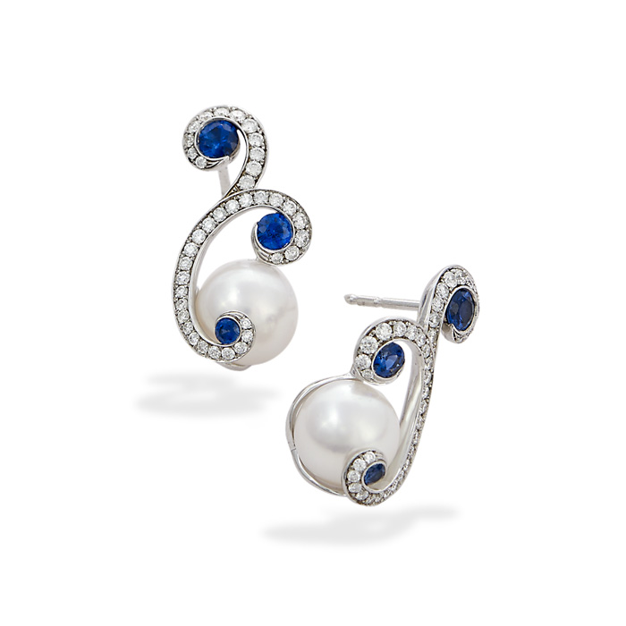 Jewelry $2,001 to $5,000 Diamond and sapphire earrings set with two 8.5 mm pearls, round sapphires and round brilliant cut diamonds set in 18K white gold. Hand fabricated. MSRP $3,950. Jeweler: David White Aucoin Hart Jewelers Metairie, LA