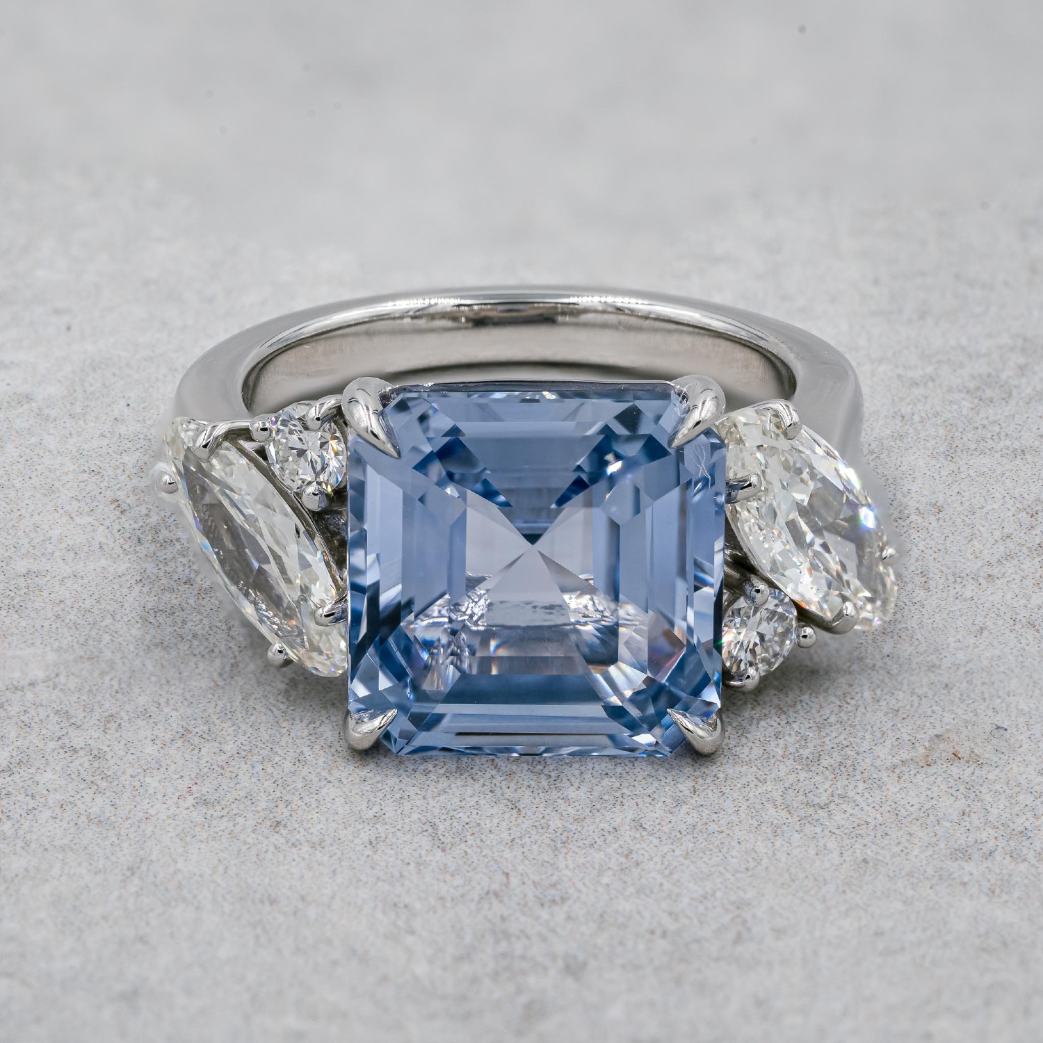Retailer: Best in Show Platinum ring containing a heat treated 9.05 ct. octagonal step cut natural sapphire, prong set with 2 antique cut marquise (1.10 ctw) and 2 round brilliant cut diamonds (0.17 ctw) Designed by: Sarkis Sarkissian Giraux Fine Jewelry San Francisco, CA $40,000
