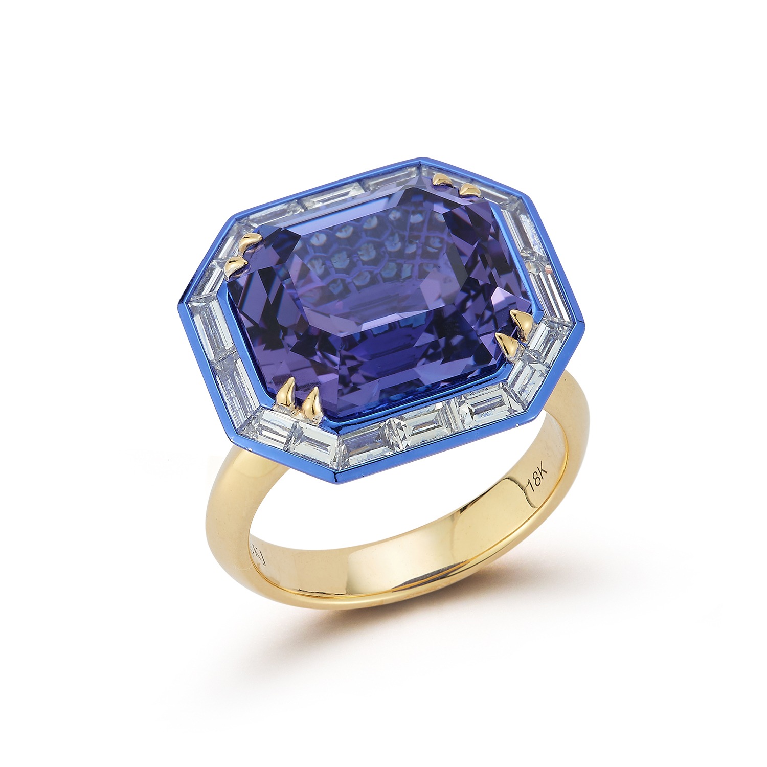 Supplier: Best in Show Unicorn ring featuring a square emerald cut tanzanite (11.77ct), tapered baguette diamonds (1.15ct), and ombre blue sapphire (2.01ct) set in 18K yellow gold and blue rhodium finish. Designed by: Katherine Jetter Katherine Jetter Ltd. Santa Fe, NM $39,300
