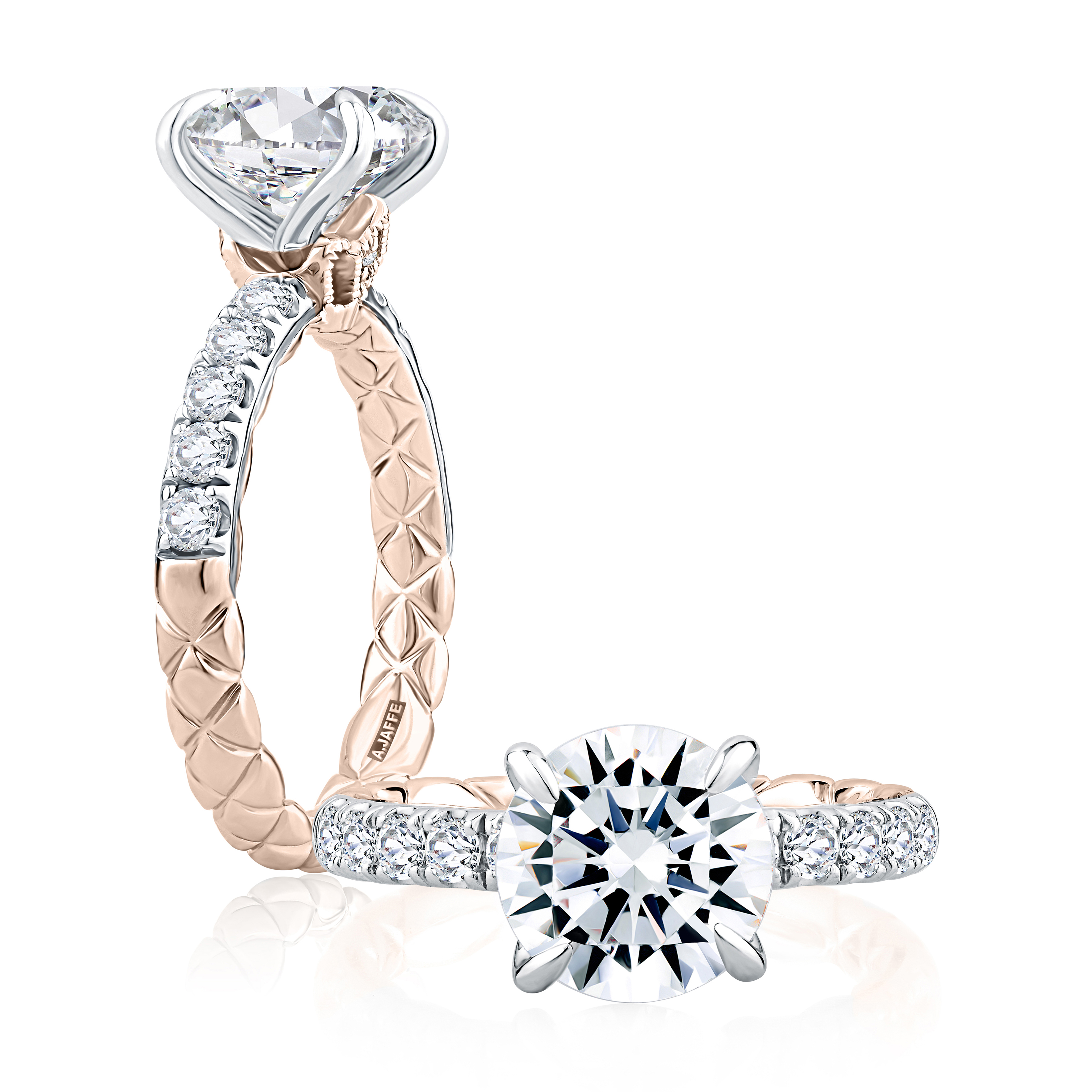 From the Modern Royals collection, this 18k round diamond engagement ring features 0.46 ctw hand-set pavé diamonds half way and the signature A.JAFFE Quilts pattern along the other half, continuing through to the interior to provide superior balance so this beauty remains upright. A delicate crown motif brings a touch of class to this regal design. With countless options available within the Modern Royals™ collection, each ring is as unique as the woman who wears it.
