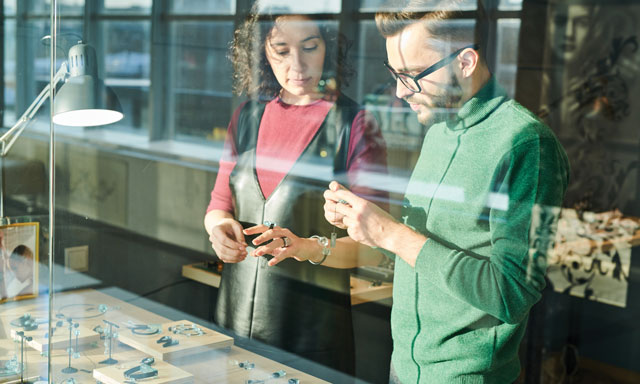 iStock image examining jewelry