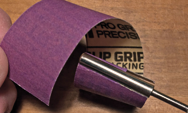 sandpaper and mandrel close-up