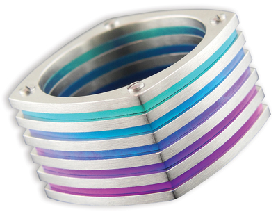 Stainless steel and anodized titanium rings by Kirk Lang