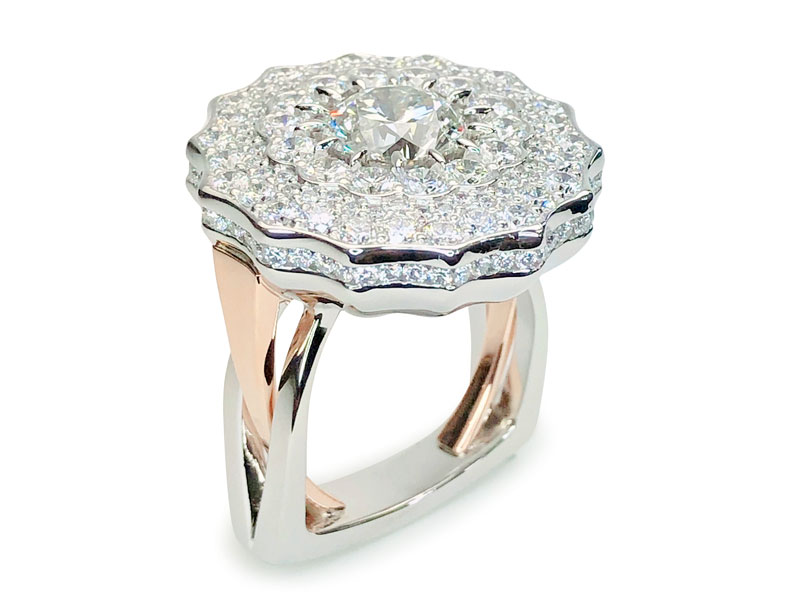 Platinum floral ring by Brody Rice