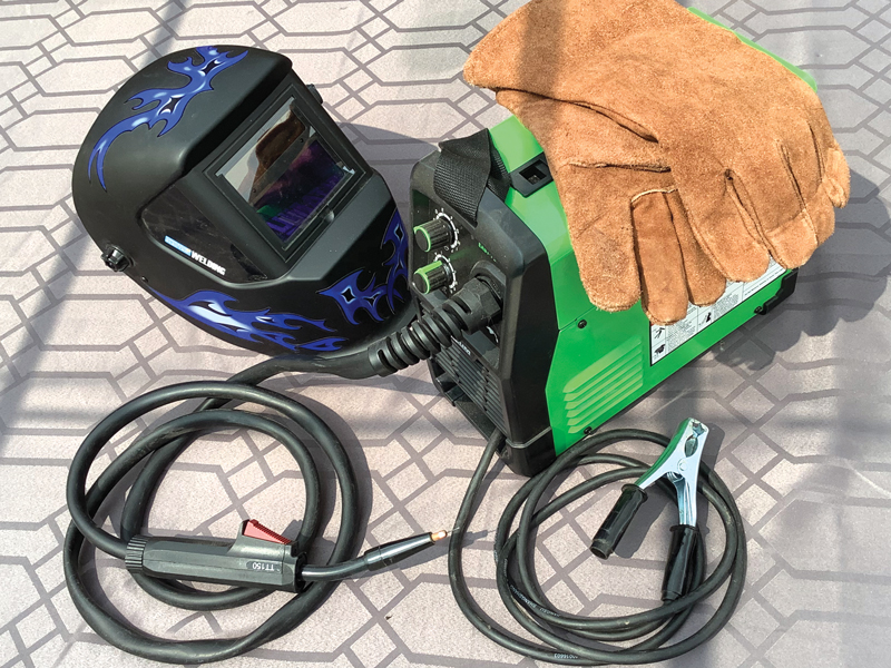 Michael Jensen's welding gear with helment and gloves.