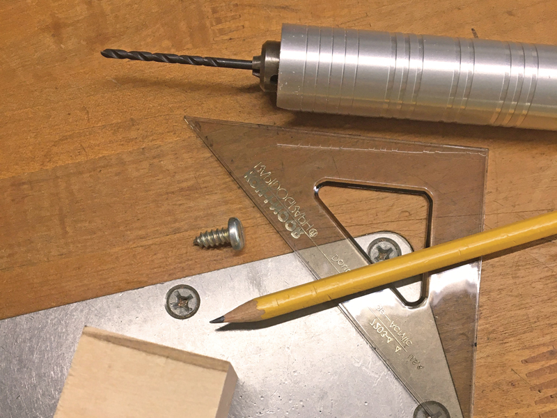 Materials and tools needed to create a jump ring vise for chain making
