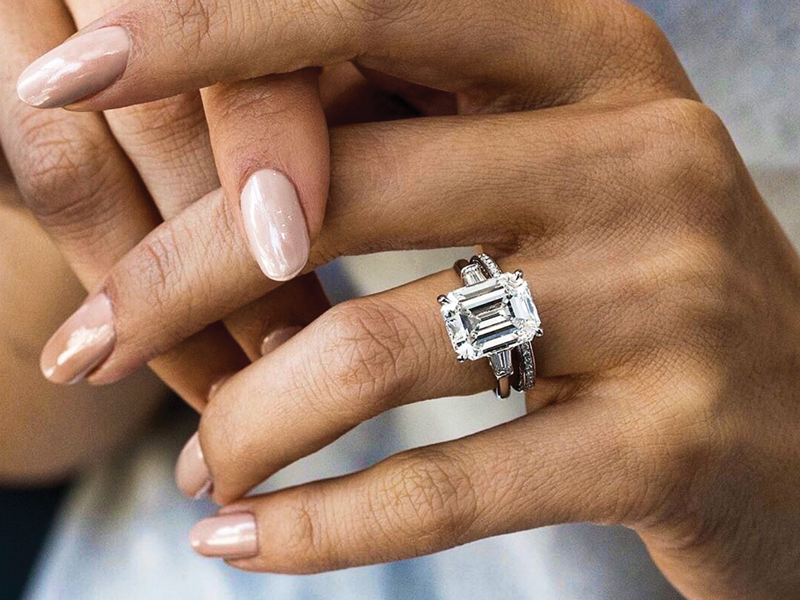 Lab-grown diamond ring on the hand of a bridal customer