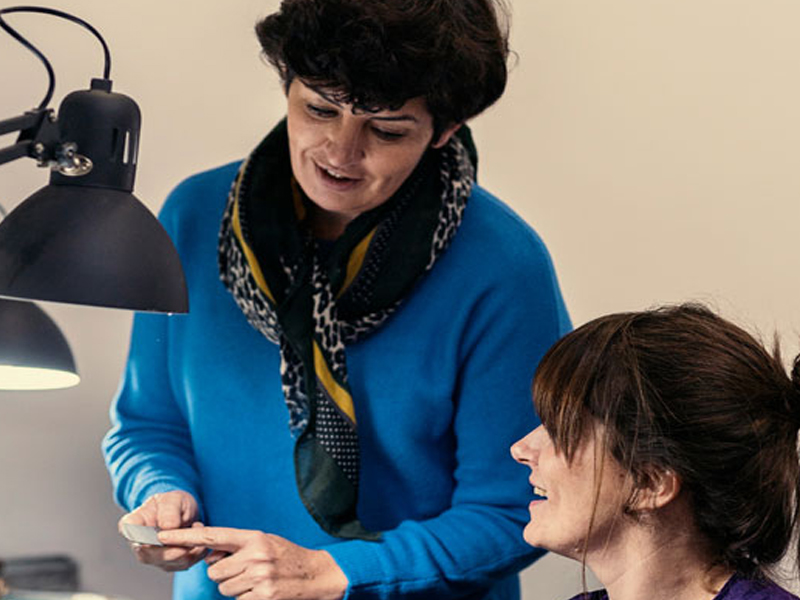 Mentor helping a jewelry student